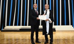 “Dr. İrfan Karatutlu, İlahiyat Fakültesi Diplomasını Aldı”