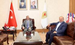 Ünlüer, Kazakistanlı Akademisyeni Makamında Ağırladı